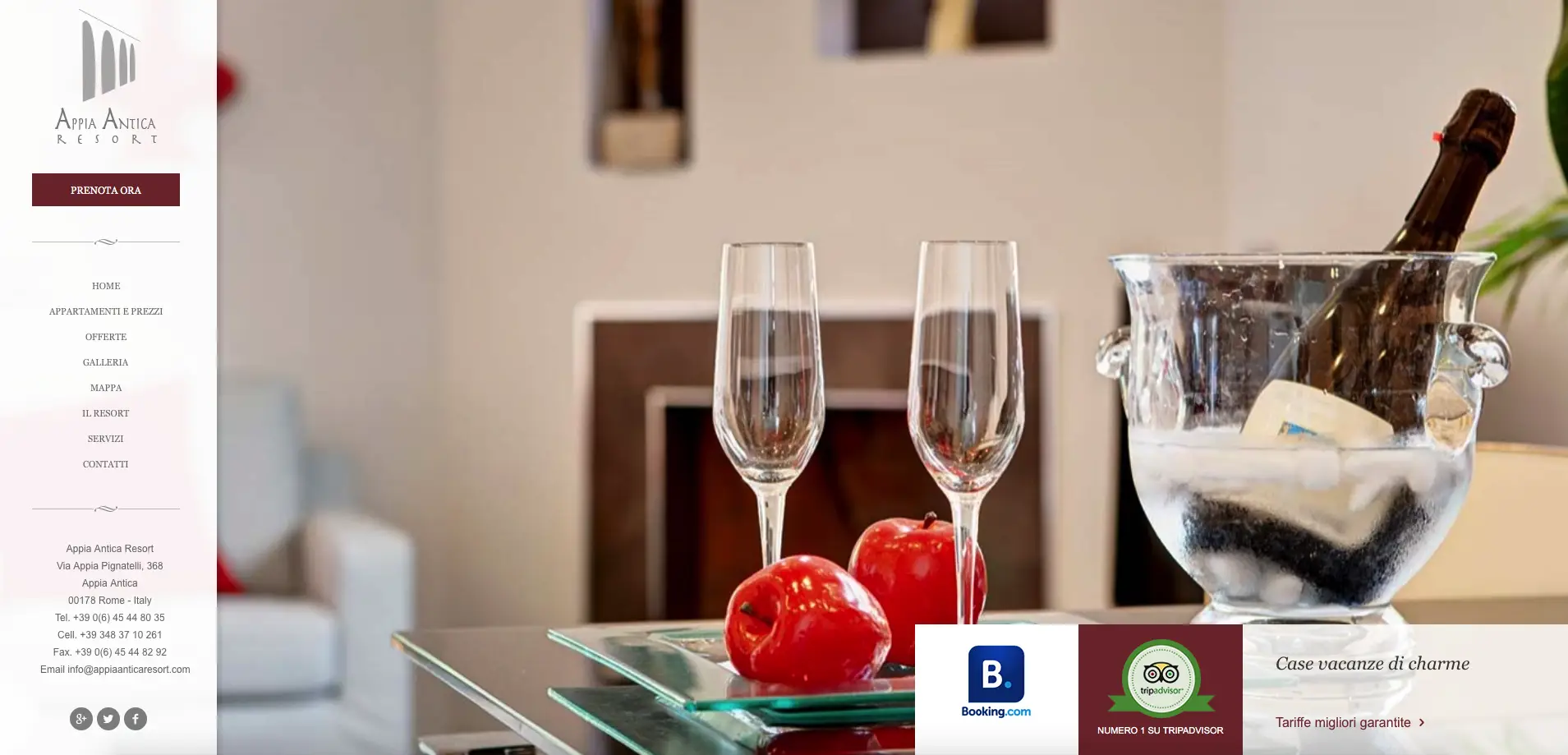 Interni eleganti dell'Appia Antica Resort con due calici e una bottiglia di spumante in un secchiello del ghiaccio.
