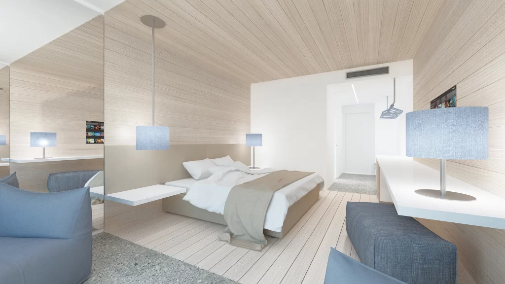 Immagine di una camera d'hotel moderna con arredamento chiaro, lampade da tavolo blu, un letto matrimoniale e un'atmosfera accogliente e luminosa.